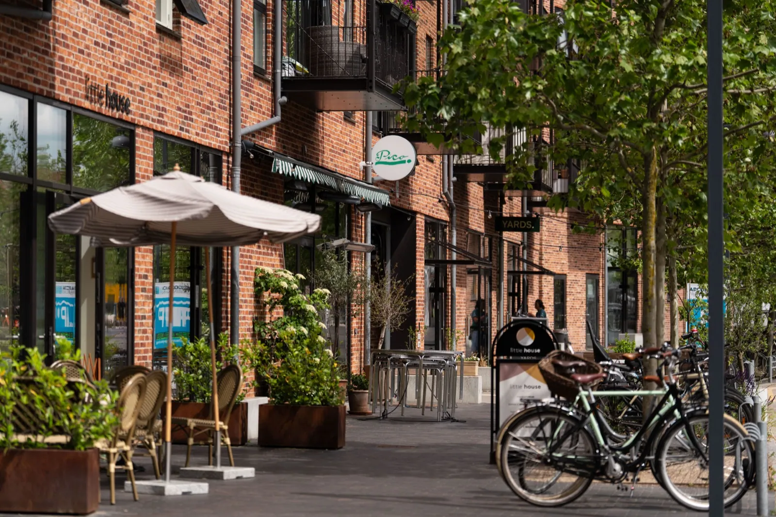 A café-lined street in Valby, Copenhagen